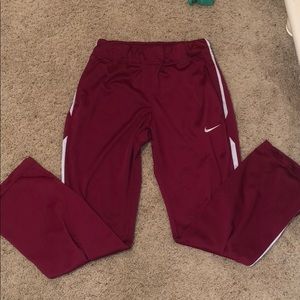 Dark red Nike sweatpants